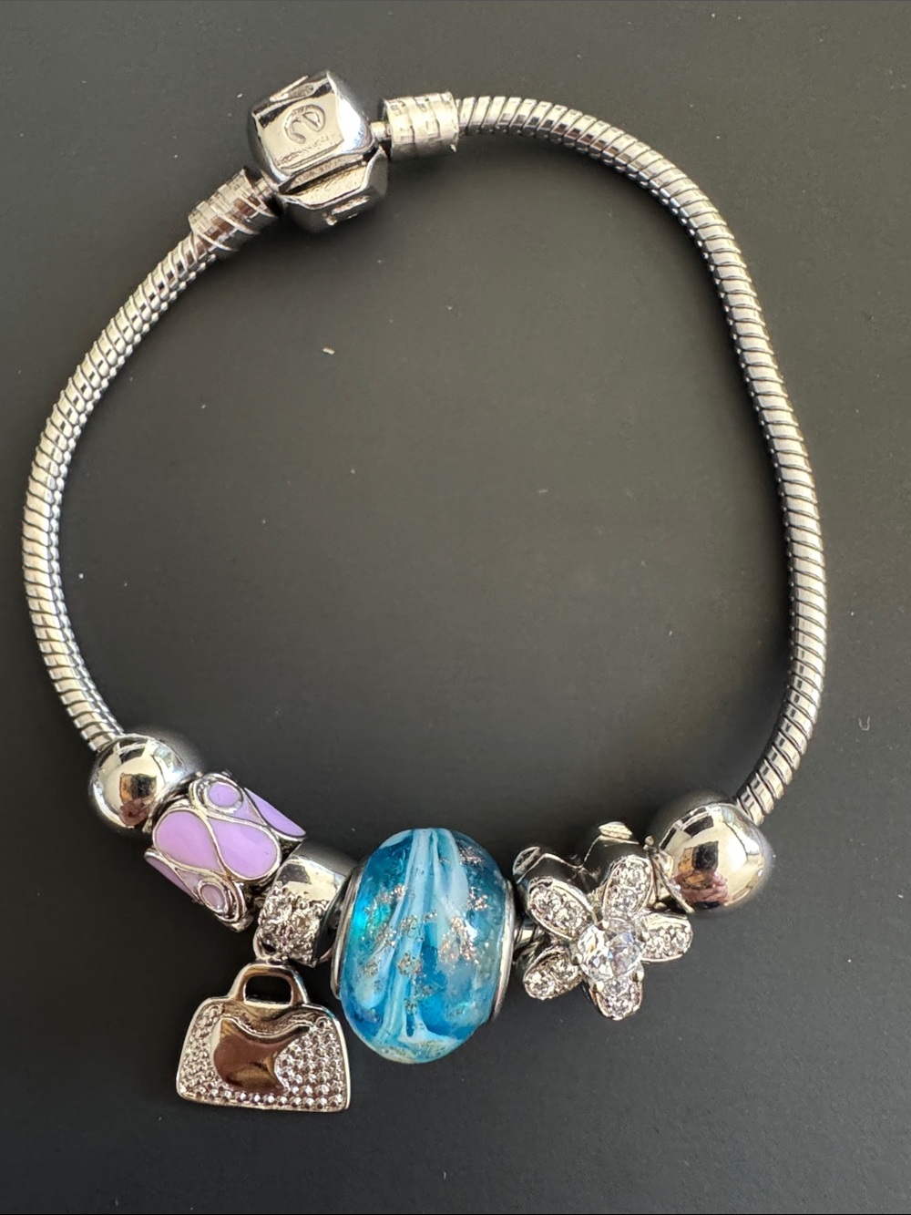 Silver Tone Bracelet with Decorative Charms